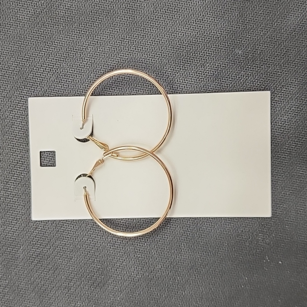 Gold hoop earrings.